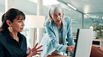 Women, discussion and review in office with computer, financial planning and manager opinion for audit. Mature people, talk and teamwork in workplace with desktop, explain budget and finance advice.