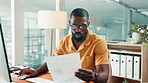 Black man, computer and documents with review at office for typing, confused or glasses at media company. Person, pc and admin with stress, check and search for project management at creative agency