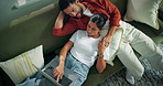 Home, above and couple on sofa, laptop for online entertainment and conversation. Apartment, man and woman on couch, pc and website info for film, relax and bonding together in living room for break