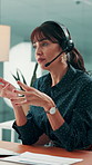 Call center, laptop and consultant in agency with headset, contact us or advice in crm service. Professional, tech and mature woman with microphone, online assistance or feedback in client support.