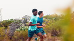 Health, mountain and people outdoor with running, workout or training for marathon or race. Fitness, sports and male athletes with cardio exercise for wellness, active or body goals in countryside.