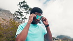 Black man, runner or nature with sunglasses for outdoor exercise, UV protection or fashion. Active, male person or style with neon lens, sight or vision for fitness, cardio run or workout on mountain