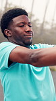 Nature, stretching arms and black man for fitness, exercise and workout for health or mobility. Sports, runner and person with warm up for training, active hobby and practice for challenge outdoor