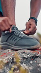 Tying, shoelace and athlete in nature, training and preparing for workout routine, cardio or fitness. Outdoor, runner and person with footwear for exercise, health and endurance for physical activity