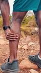 Hands, calf pain and runner in nature with injury, joint inflammation and break for exercise in summer. Person, legs and arthritis with massage, fibromyalgia or rest for fatigue with trail running