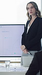 Presentation, screen and business woman with graphs for financial projection, meeting and feedback. Corporate, talking and person with monitor for finance report, chart or research for company growth