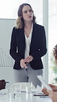 Presentation, talking and business woman with team for financial review, meeting and feedback. Corporate, office and person with whiteboard for finance report, chart and workshop for company growth
