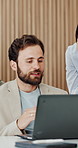 Discussion, laptop and businessman in office for collaboration on finance report with budget plan. Computer, meeting and team of financial advisors with feedback on investment proposal in workplace.