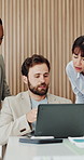 Meeting, laptop and businessman in office for collaboration on finance report with budget plan. Computer, discussion and team of financial advisors with feedback on investment proposal in workplace.