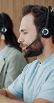 Call center, headset and man in office, talking and communication for system solution. Person, contact us or employee in workplace, conversation and feedback for customer service, crm or consultation