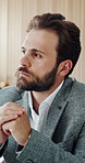 Thinking, planning and businessman in office for ideas, brainstorming or reflection on finance project. Professional, problem solving and male financial manager with solution, decision or choice.