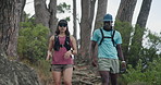 Fitness, couple and hiking on mountain with exercise, exploration and conversation for wellness goals. Active, people and walk in nature with outdoor adventure, workout chat and healthy relationship.