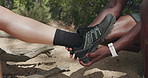 People, shoe and foot with hiking injury for sprain, muscle tension or pain on outdoor trail. Active, sneaker or sore ankle with movement or joint inflammation for strain or trekking accident on path