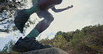 Shoes, hiking and man with journey, low angle and trekking for health benefits, holiday and exercise. Nature, hiker and person with sneakers, cardio and fitness for wellness, explore and adventure
