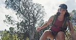 Below, climbing and hiking with woman in mountain forest for adventure, sports hobby or training. Exercise, fitness and rugged with hiker person outdoor in nature for discovery, health or journey