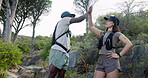 Nature, high five and friends with smart watch for fitness, hiking adventure and journey time goals. Support, outdoor or happy people with celebration for achievement, tech or trekking target success