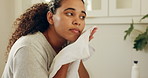 Cleaning face, dry and towel with woman in bathroom of home for hygiene or wellness routine. Grooming, skincare and washing with person in apartment for daily or morning cleansing and self care