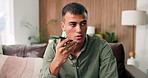 Phone, recording and thinking with man on sofa in living room of home for audio reminder. App, talking an voice note with thoughtful person in apartment for mobile memo of schedule or to do list
