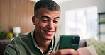 Home, funny and man in lounge, smartphone for online announcement and digital app for social media. Network, connection and person on sofa, impressed and cellphone for message and reaction for email
