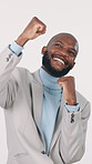 Excited, black man and winning with fist pump in studio for good news on a white background. Happy, businessman and celebration with smmile for business success, achievement or company promotion