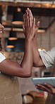 High five, tablet and barista or people in cafe for hospitality, digital inventory or restaurant supply checklist. Research, catering target and small business owner with man and woman in coffee shop