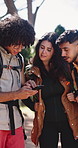 Hiking, phone and talking with friends in forest together to search map for journey directions. App, conversation and guide with group of people outdoor in nature for adventure, travel or trip