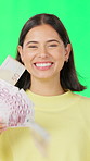 Face, woman and money rain on green screen with wealth, investment profit and smile for lottery win. Happy person, cash shower and fan in studio with financial freedom, gambling success and jackpot.