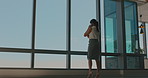 Window, talking and woman with phone call in hallway, consulting client and stocks investment discussion. Walking, feedback and investor with mobile for economic update, planning and trading advice