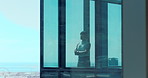 Window, thinking and business woman with arms crossed, view and realtor with insight in office. Reflection, confidence and space with decision for real estate, problem solving or property opportunity