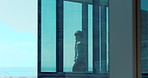 Window, thinking and businessman with phone call, view and realtor with conversation in office. Reflection, chat and space with decision for real estate, problem solving or property opportunity