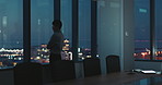 Man, thinking and night at office by window with reflection, deadline and insight at insurance company. Person, broker and advisor with perspective, overtime and solution at risk assessment agency