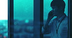 Argument, business and phone call with Asian man in glass office at night for conflict or discussion. Anger, cityscape and evening view with unhappy employee in corporate workplace for disagreement