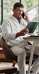 Remote work, phone call and man with tablet at desk, client feedback and firewall software project. Talk, explain system plan or person with tech for security program development, freelance or home