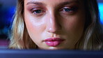 Technology, woman and coder in office at night for research on programming project with deadline. Reading, overtime and female web designer with online update for software development in workplace.
