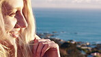 Happy, woman and thinking outdoor with ocean view, positive attitude and contemplation for holiday. Female person, smile and reflection in town with beach, sightseeing and sunshine for vacation trip.