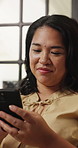 Chat, online and woman with smartphone in lounge, thinking and communication with contact on website. House, flare and person with smile on break, reflection and texting with mobile or social media