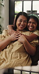 Hug, smile and face of mother and daughter in family home for bonding, connection and love. Happy, weekend break and support with woman and child in living room of apartment for care and comfort