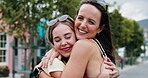 Friends, women and hug for reunion on street for support, bonding and connection for relationship. Embrace, love and happy people with affection for weekend hang out, care and outdoor together