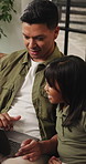 Laptop, talking and dad with child on sofa for website, online streaming and browse internet together. Home, family and father with girl on computer for movie choice, videos and bonding on weekend