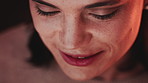 Face, reaction to memory and smile of woman at night for contemplation, nostalgia or reflection. Dark, funny thought and remember with happy person thinking of idea, opportunity or perspective