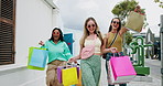 Shopping bags, walk or friends in town with bonding, good time or connection with retail discount. Fun, happiness or women outdoor with purchases, healthy relationship or excited for apparel sale.