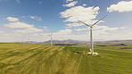 Drone, wind turbine and renewable energy for sustainability,  empty and eco friendly environment. Outdoor, nature and ecology for power, landscape and countryside for carbon footprint and windfarm
