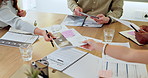 Hands, team or business people with paperwork for planning, sales revenue or performance data. Meeting, group or giving document, graphs or investment discussion for growth strategy in office