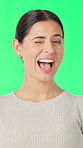 Face, woman and wink on green screen for secret, laugh and flirt expression on studio background. Portrait, person and blink with funny gesture, eye emoji and playful with romantic sign for happiness