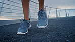 Sneakers, ground and feet with steps on bridge, outdoor cardio training and running on spot for break. Heart rate maintenance, active and person with exercise for fitness, shoes and workout pause