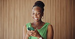 Phone, laugh and black woman in office with texting, social media or chatting on mobile app. Technology, happy and African female person with cellphone for typing email, communication or contact.