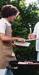 Meat, men or friends with beer at bbq in backyard for celebration cheers, social event or relax. Happy, people or beef barbecue on grill in home garden with drinks toast, gathering or weekend reunion
