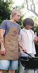 Talking, men and friends with beer at barbecue in backyard for birthday party, social event or flare. Chat, happy people or bbq on grill in home garden with drinks, holiday cookout or weekend reunion