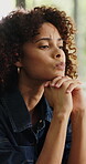 Thinking, sad and woman in house with nostalgia, confused mindset or mistake in wrong decision. Flare, past memory or female person in living room with reflection, questioning or regret in home.