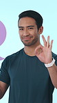 Speech bubble, okay and coach with face of man in studio for mockup, social media comment and icon. Gym review, personal trainer promotion and space with person on blue background for pointing